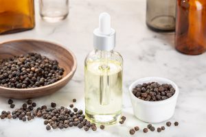 Read more about the article The Uses and Benefits of Black Pepper Essential Oil